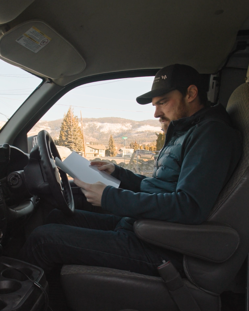 Electrician struggling with quoting in their van.